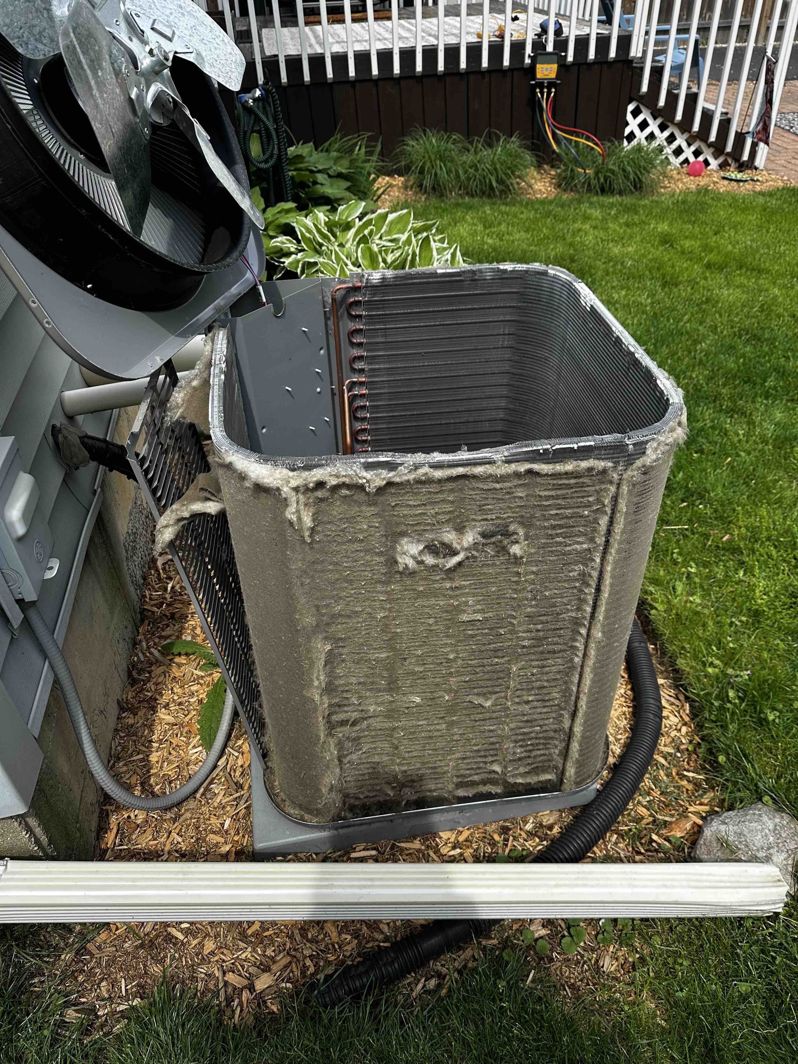 old AC unit prior to maintenance in racine